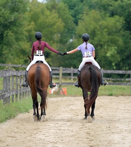 candid backs of 2 riders Marcozzii